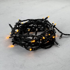Гирлянда Нить 10м Желтая с Мерцанием Каждого Диода 220В, 75 LED, Провод Черный Каучук, IP65